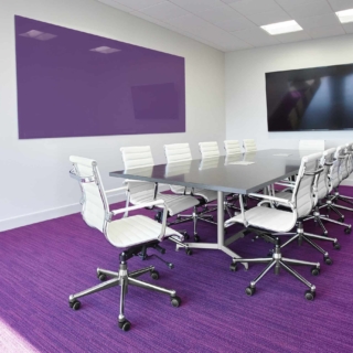 purple float wall-mounted glass board in meeting room